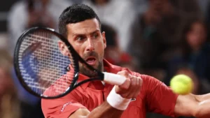 Novak Djokovic mengalahkan Lorenzo Musetti dalam pertandingan maraton Prancis Terbuka